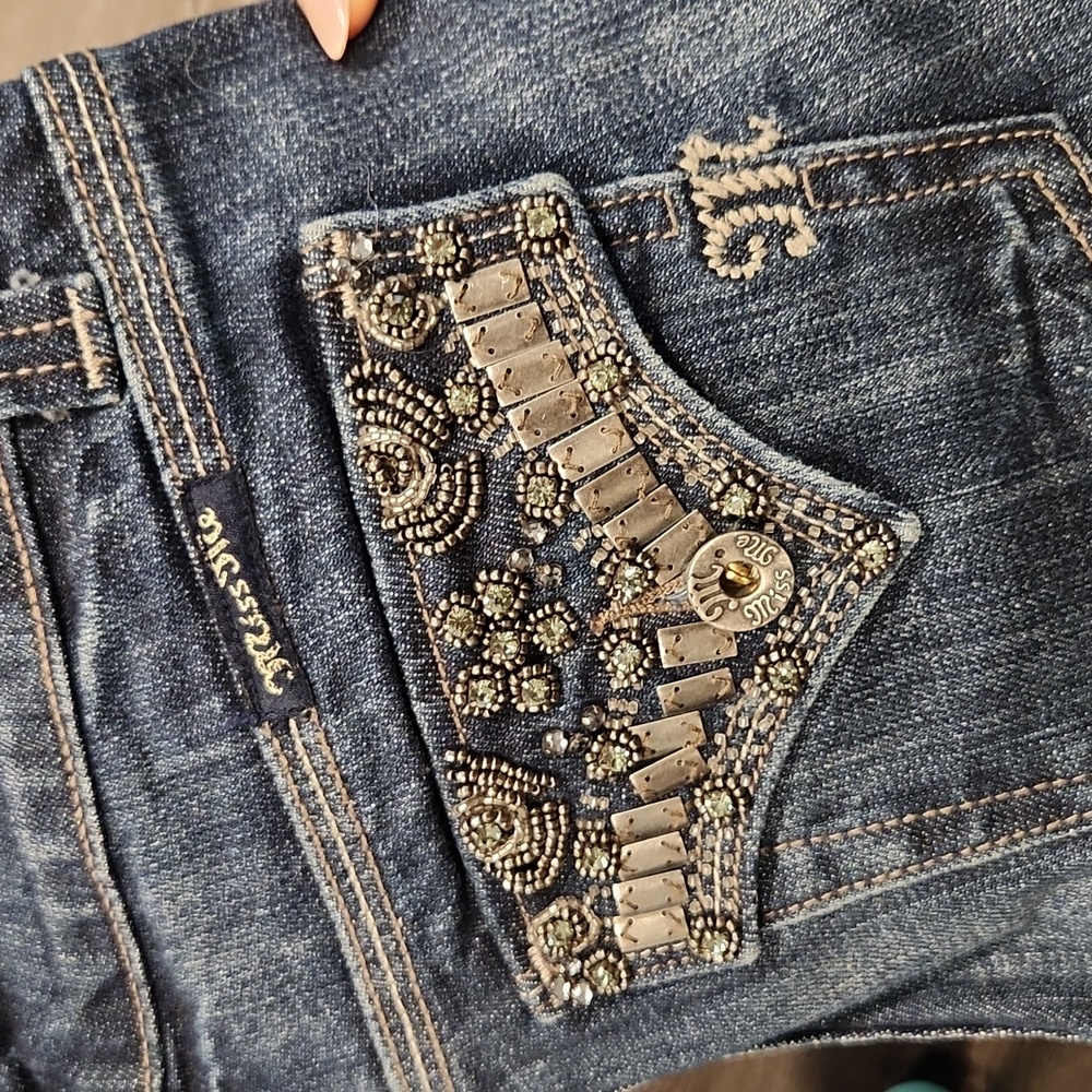 Miss Me Jean's Size 25 with Faux flap pocket design with mini rhinestone rivets
